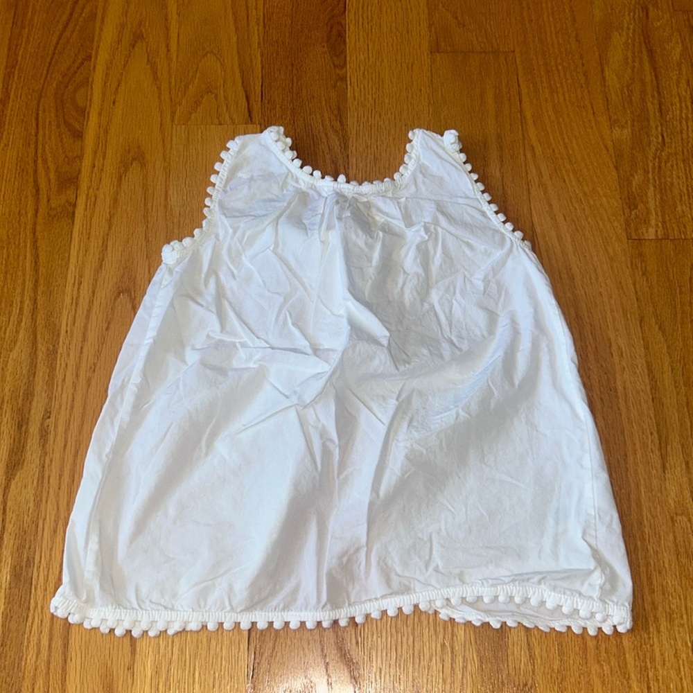 Carter’s white open back tank top, size kids 6x